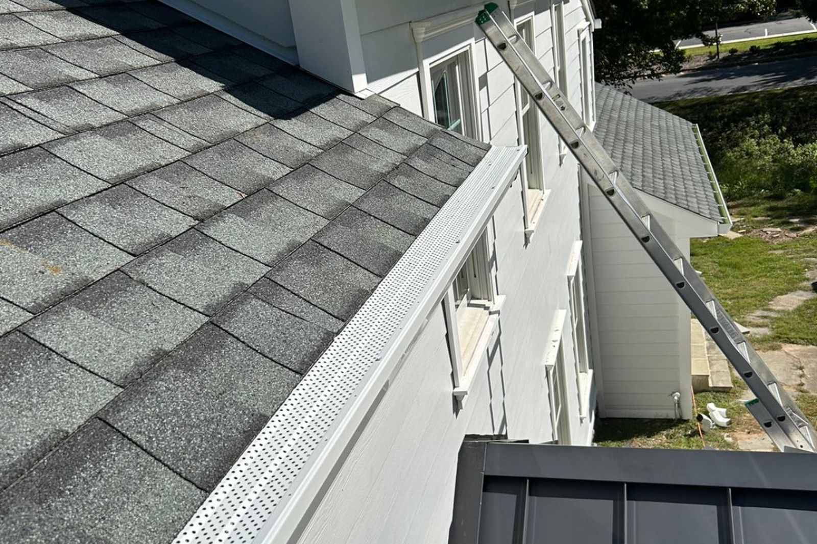 Newly installed gutters with leaf guards on a New Jersey home