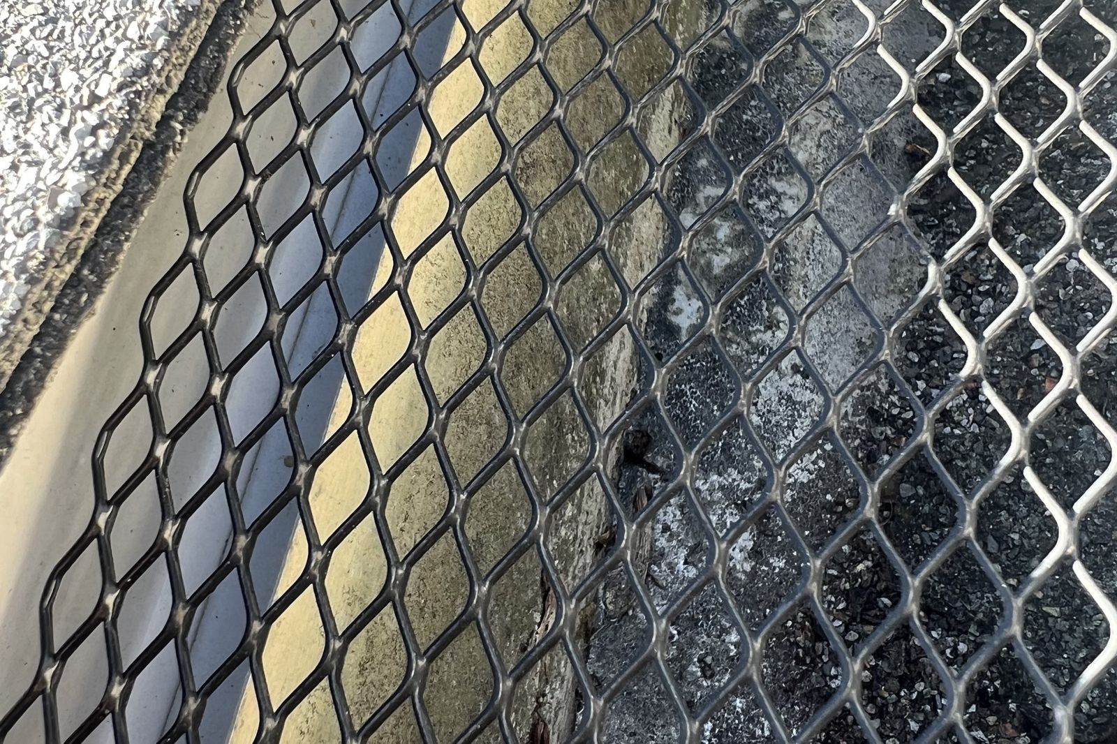 Close-up detail of gutter guard mesh installed on a New Jersey home